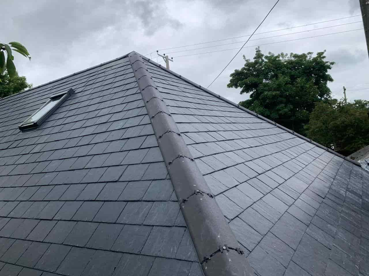 This is a photo of a new slate roof installation. This work was carried out by Roofing Barrow In Furness